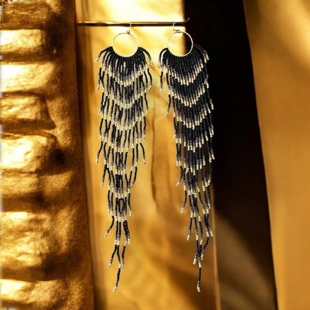Black and Gold Glass Beaded Chandelier Earrings with Cascading Feather Design